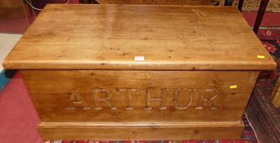 Lot 1317 - A contemporary pine hinge topped toy chest,...