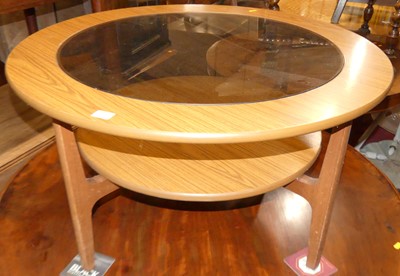 Lot 1329 - A 1970s teak effect laminate circular and...