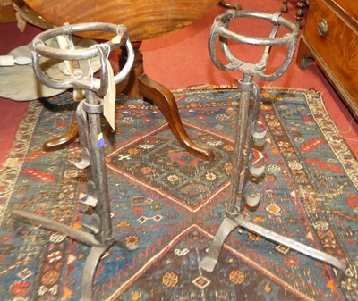 Lot 1331 - A pair of forged iron fire-dogs, each h.59.5cm