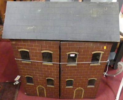 Lot 1348 - An early 20th century painted two-storey dolls...