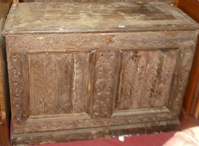 Lot 1359 - A floral line and relief carved oak twin...