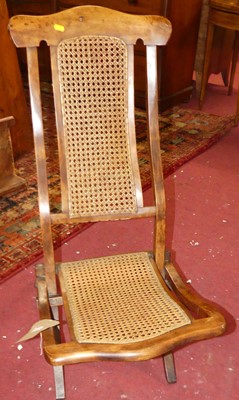 Lot 1370 - A circa 1900 fruitwood and cane inset folding...