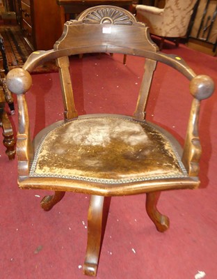 Lot 1376 - An Edwardian walnut tub revolving desk chair,...