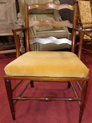 Lot 1380 - A beech framed shaped ladderback single elbow...