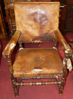 Lot 1383 - A Cromwellian style joined oak framed tan...