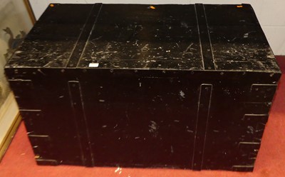Lot 1069 - A black painted wooden and metal bound trunk,...
