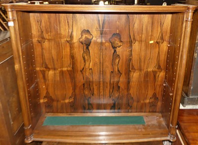 Lot 1429 - A rosewood wall-mounted open wall shelf, with...