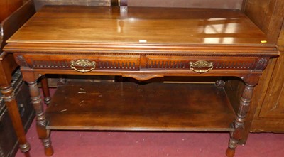 Lot 1433 - An Edwardian walnut two-drawer two-tier side...