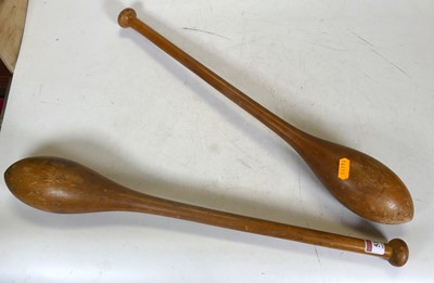 Lot 517 - A pair of antique Indian clubs for exercising,...