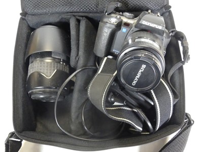 Lot 505 - An Olympus E500 digital camera, together with...