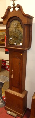 Lot 1172 - An antique oak longcase clock, having an...