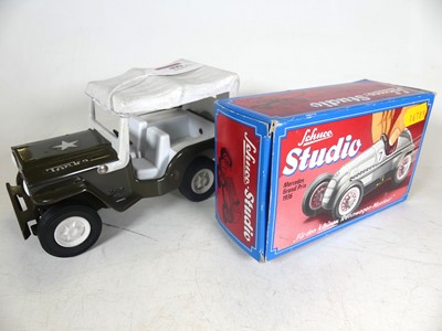 Lot 490 - A Schuco studio clockwork model car, boxed,...