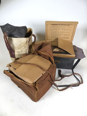 Lot 494 - Three various WWII period gas masks