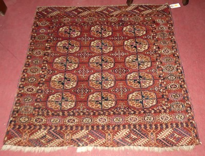 Lot 1443 - An Ersari woollen rug, decorated with three...