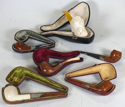 Lot 396 - A collection of smoking pipes to include...