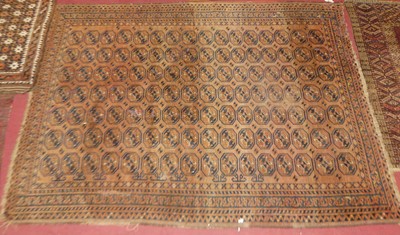 Lot 1454 - An Afghan woollen Bokhara rug, having a rust...