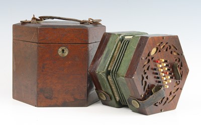 Lot 1382 - A late Victorian concertina, of typical...