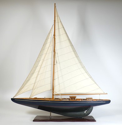 Lot 21 - A painted wooden pond yacht, on stand, h.110cm