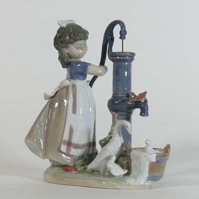 Lot 55 - A Lladro porcelain figure 'Summer on the Farm'...