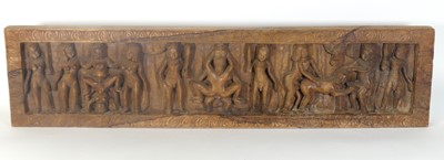Lot 542a - An Indian hardwood panel, 20th century, carved...