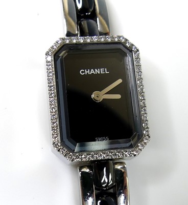 Lot 2368 - A lady's steel Chanel bracelet watch, having a...