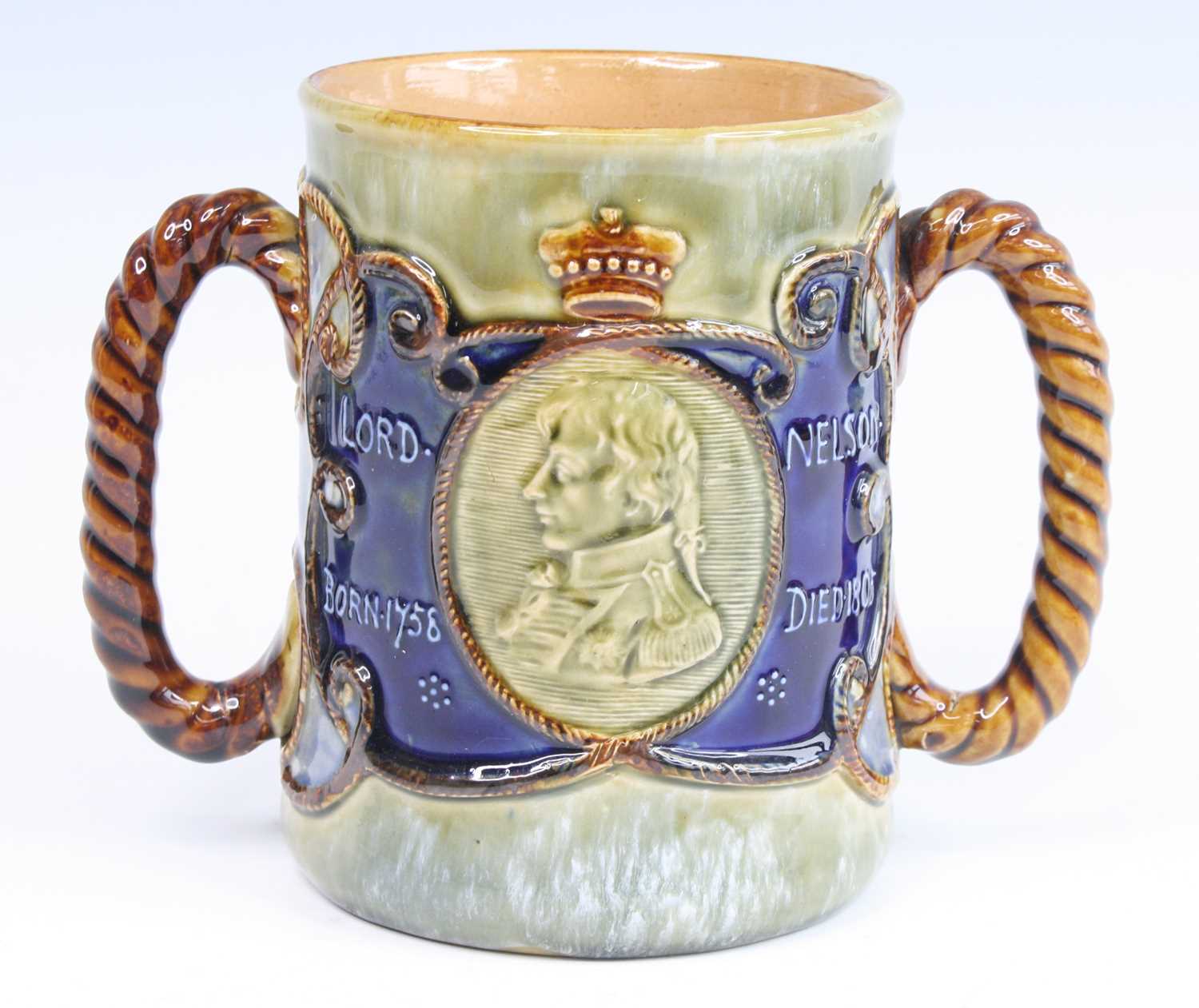 Lot 2057 - A Royal Doulton stoneware loving cup, circa...
