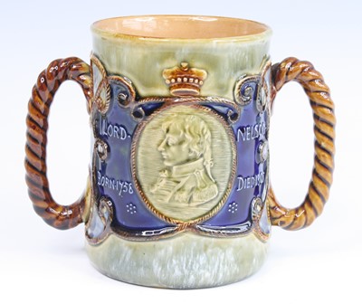 Lot 2057 - A Royal Doulton stoneware loving cup, circa...