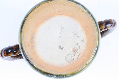 Lot 2057 - A Royal Doulton stoneware loving cup, circa...