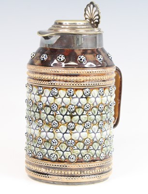 Lot 2061 - A Doulton Lambeth stoneware jug, having a...