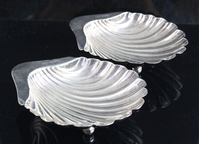 Lot 195 - A pair of Edwardian silver butter dishes, each...