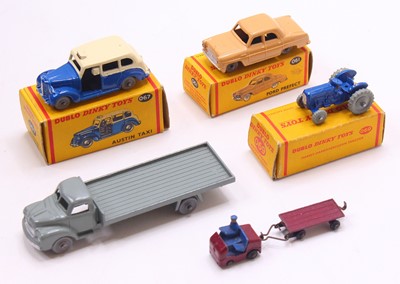 Lot 1316 - Five Dublo Dinky Toys: 067 Austin Taxi treaded...