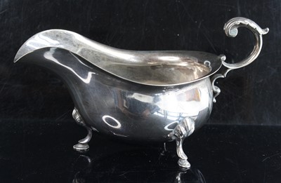 Lot 196 - An Edwardian silver sauce boat, of plain...