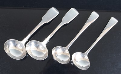 Lot 200 - A pair of Victorian, silver sauce ladles in...