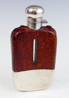 Lot 2097 - A George V silver mounted 1/3 pint hip flask,...