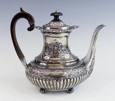 Lot 2179 - A late Victorian silver coffee pot, of half...