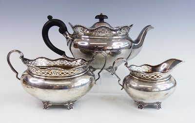 Lot 2212 - A George V silver three-piece tea set,...