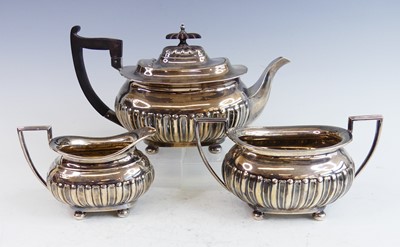 Lot 2214 - A George V silver three-piece tea set,...