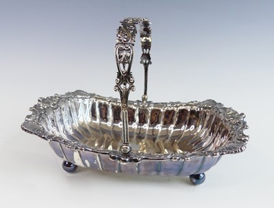 Lot 2186 - An Edwardian silver swing handled table basket,...