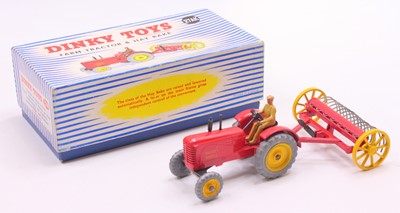 Lot 1224 - Dinky Toys No. 27AK farm tractor and hay rake...