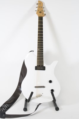Lot 1396 - A solid body six string electric guitar, in...