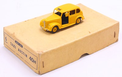 Lot 1193 - Dinky Toys trade box No. 40H Austin taxi,...