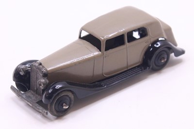 Lot 1153 - Dinky Toys No.30C Daimler in Fawn/grey body...