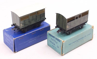 Lot 278 - Two Hornby Dublo 3 rail GWR cattle trucks, two...