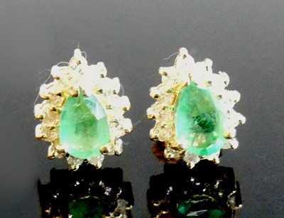 Lot 2277 - A pair of yellow metal, emerald and diamond...