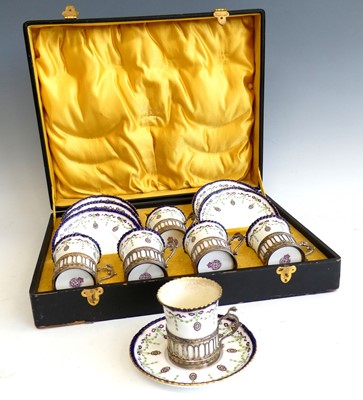 Lot 2079 - An Edwardian cased set of six coffee cans and...