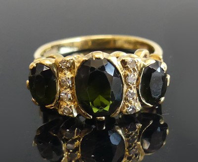 Lot 2308 - An 18ct yellow gold, tourmaline and diamond...
