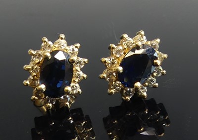 Lot 2250 - A pair of yellow metal, sapphire and diamond...