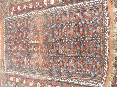 Lot 1137 - A Baluch woollen rug, North-East Iran, 206 x...