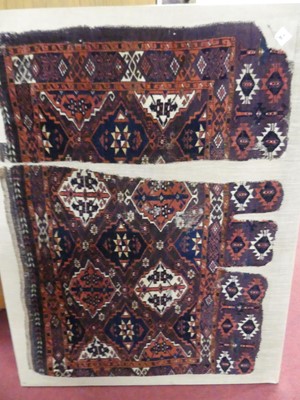 Lot 1141 - A Chodor Chuval woollen rug, in fragments and...