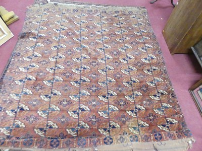 Lot 1139 - A Persian woollen Tekke carpet, 205 x 193cm...